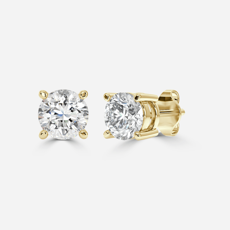 Classic round lab grown diamond solitaire earrings in yellow gold with 4 prongs.