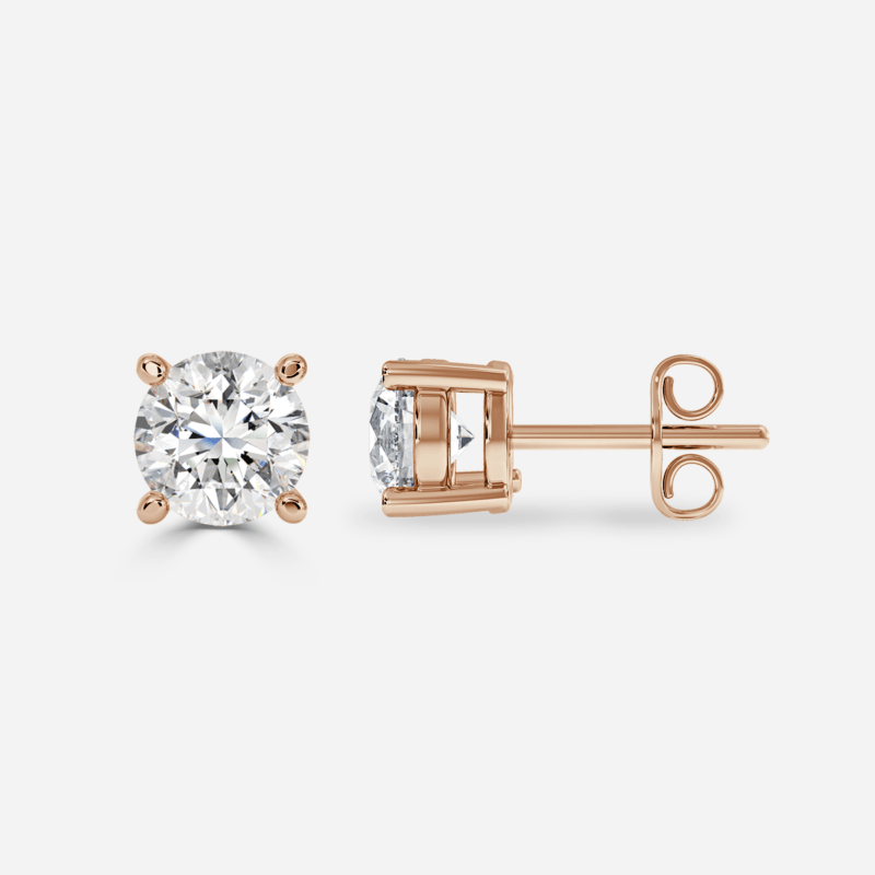 Side view - Classic round lab grown diamond solitaire earrings in rose gold with 4 prongs.